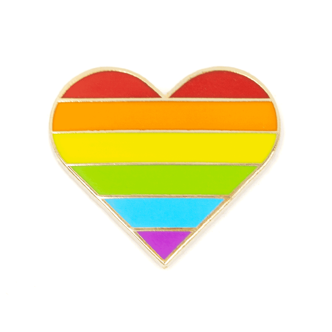 Heart-shaped pin with rainbow stripes on a white background