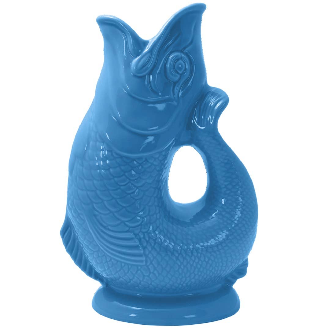 A solid blue ceramic gluggle jug in the shape of a fish.