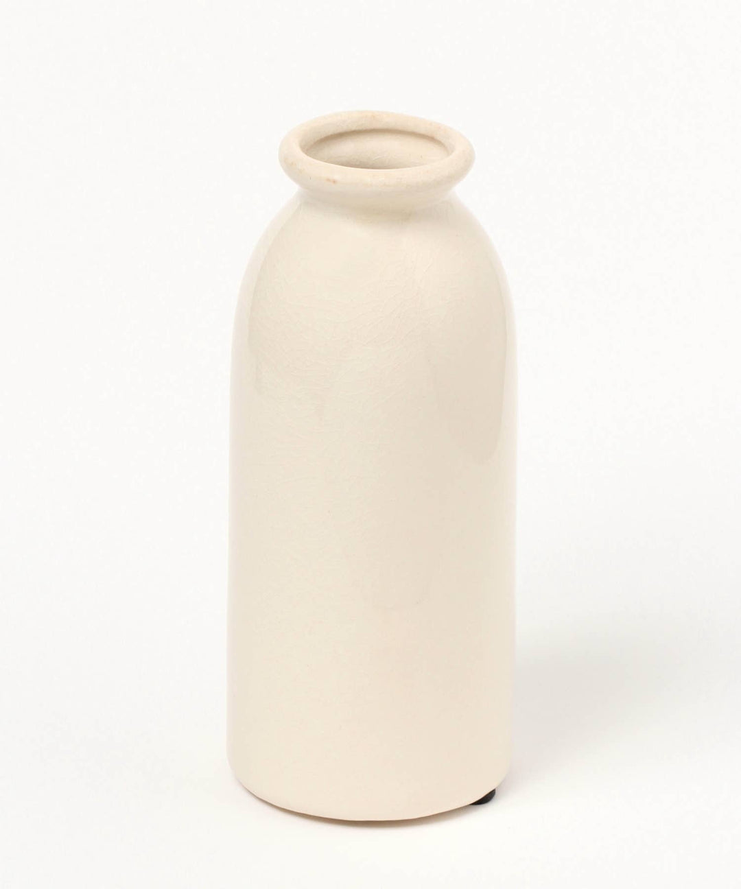 A white ceramic flower vase designed to resemble a classic milk bottle with fine cracks on the surface.