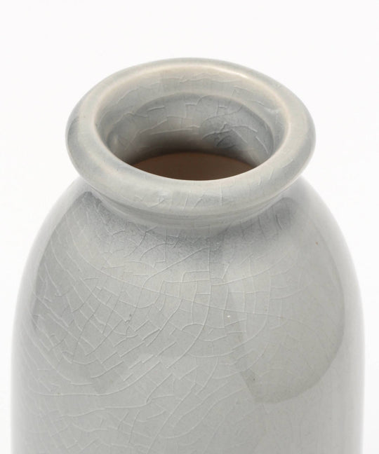 Gray textured vase on a white background