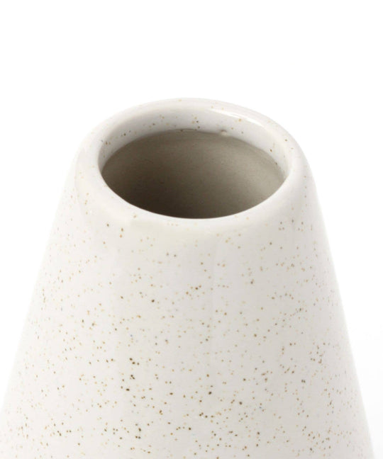 Speckled white ceramic vase on a white background