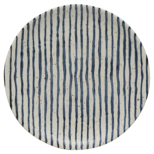 Round ceramic plate with blue vertical stripes on a white background