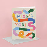 Colorful card with snake design and 'MISSSS YOU!' text on a pink background