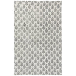 Patterned rug with a floral design on a white background