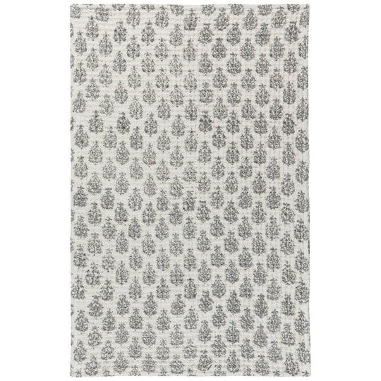 Patterned rug with a floral design on a white background