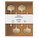 Set of four ginkgo leaf-shaped spoons in a 'danica Heirloom' packaging.