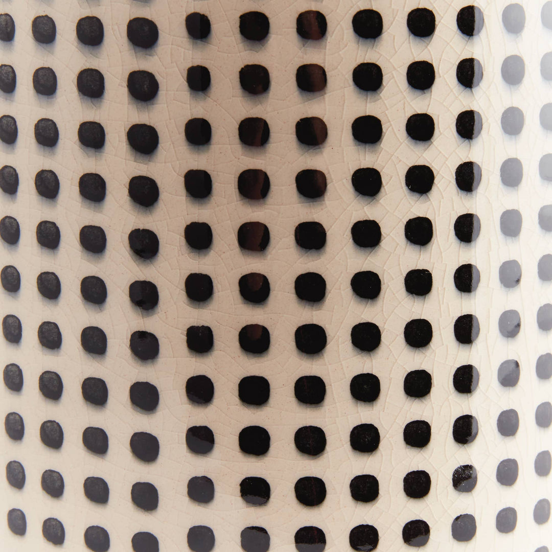 Close-up of a textured surface with black and gray dots