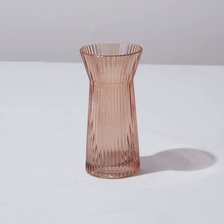Pink ribbed glass vase for fresh floral arrangements