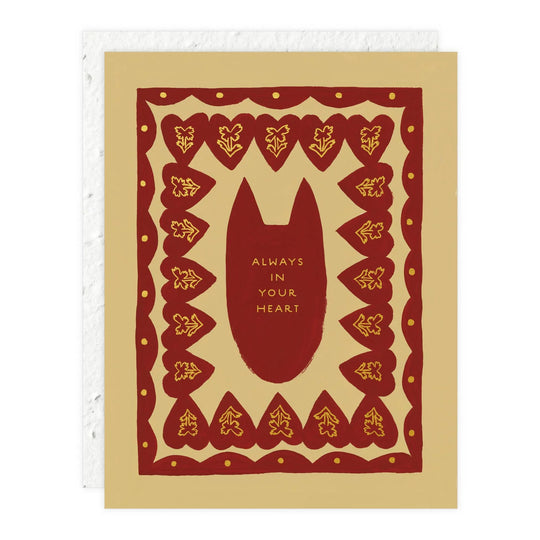 Card with a red bat illustration and 'Always in your heart' text on a beige background