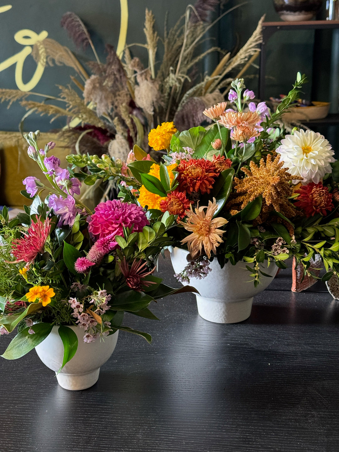 Colorful flower arrangement on a dark surface
