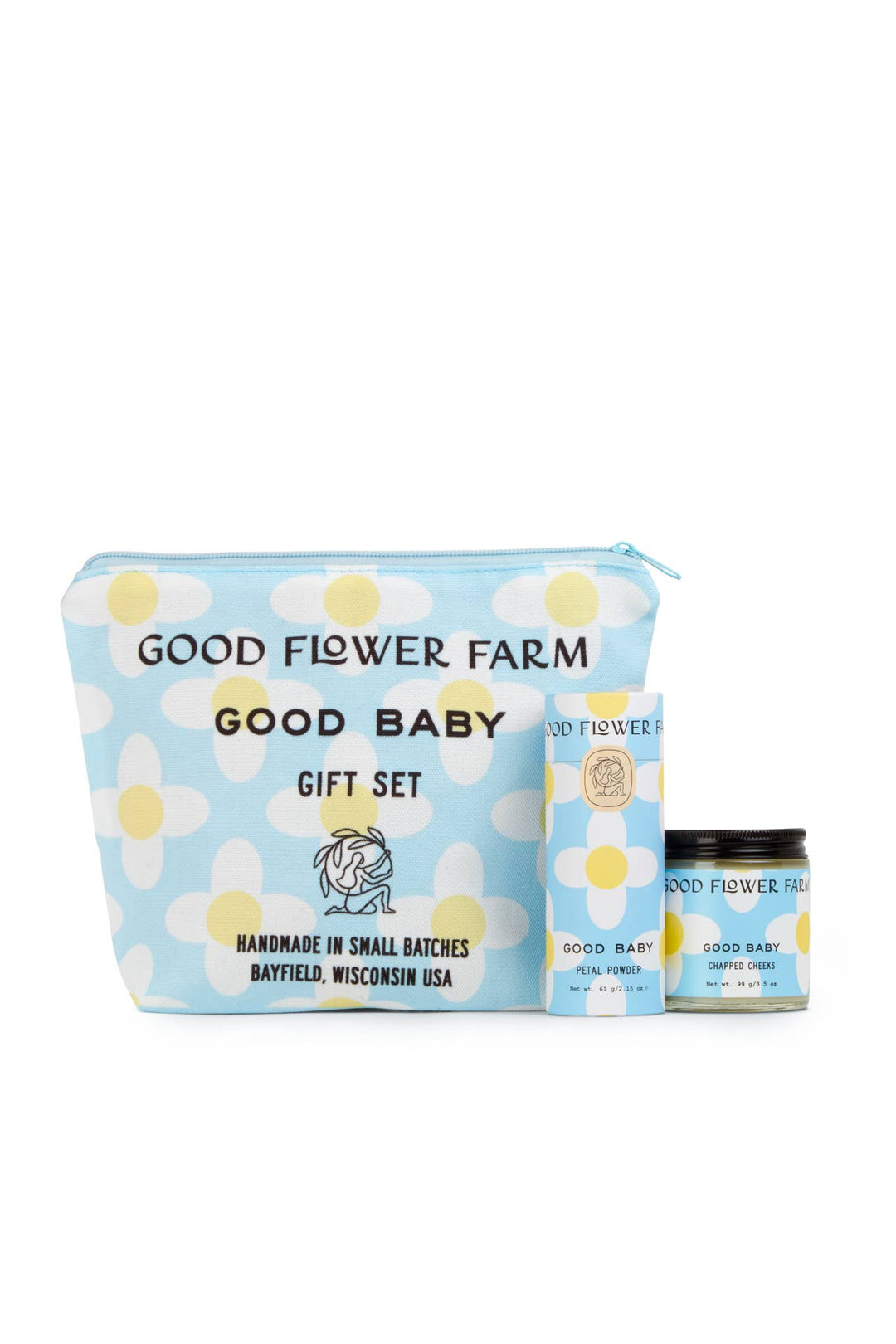 Good Flower Farm Good Baby gift set with a pouch, jar, and small container on a white background