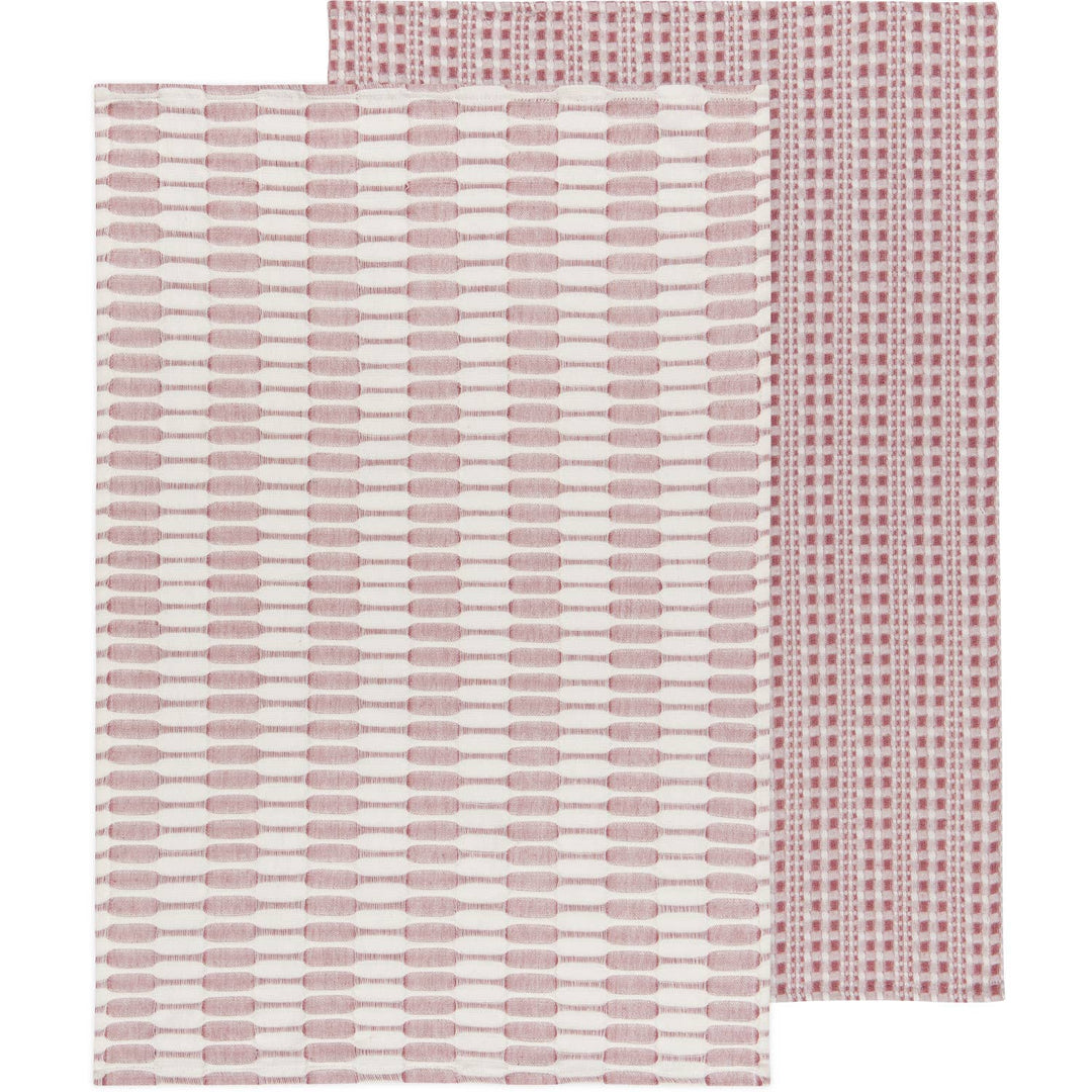 Two patterned cloths, one with a subtle pink line design and the other with a red and white checkered pattern, on a white background.
