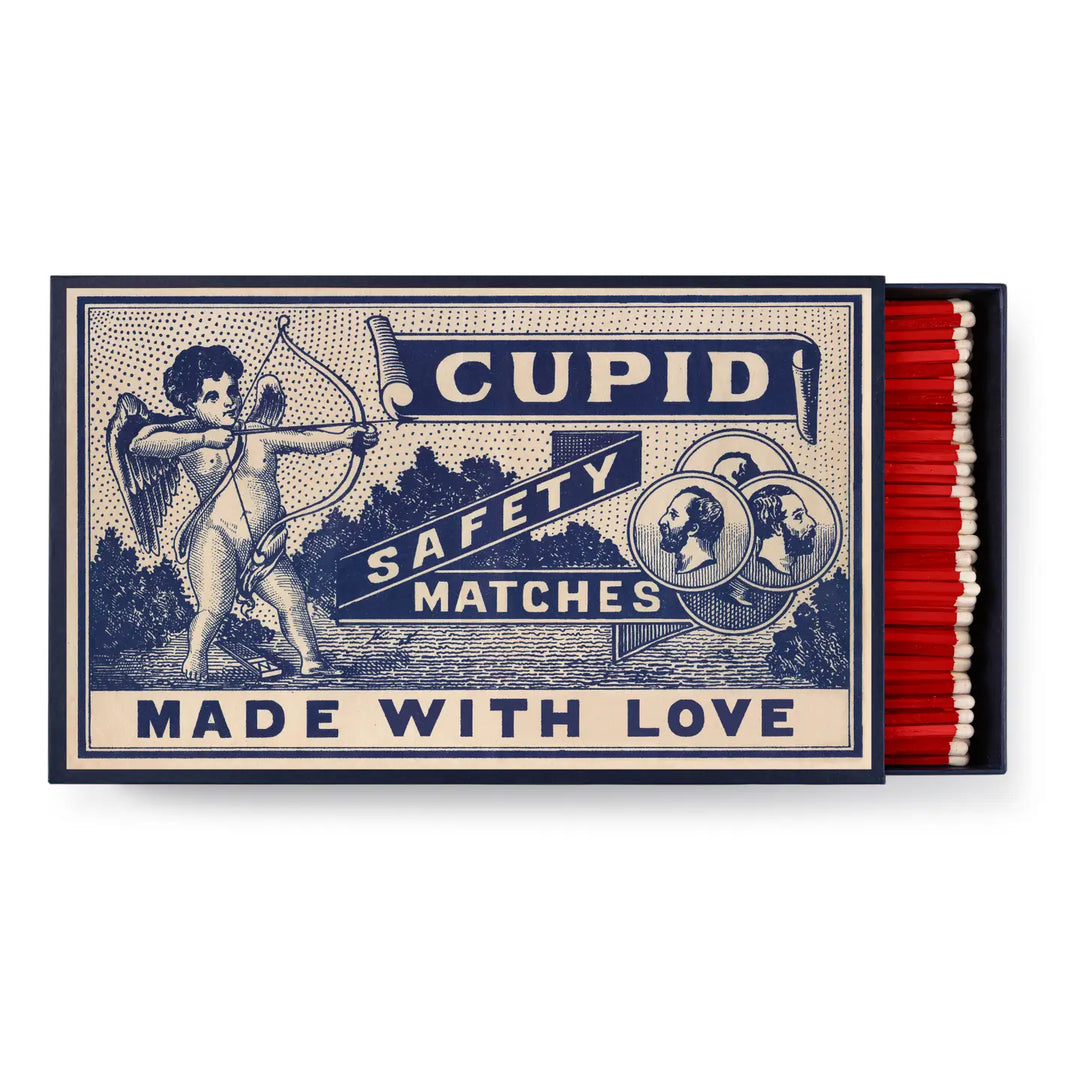 Matchbox with Cupid design and text 'Cupid Safety Matches Made with Love' on a white background