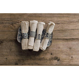 Set of folded napkins on a wooden surface