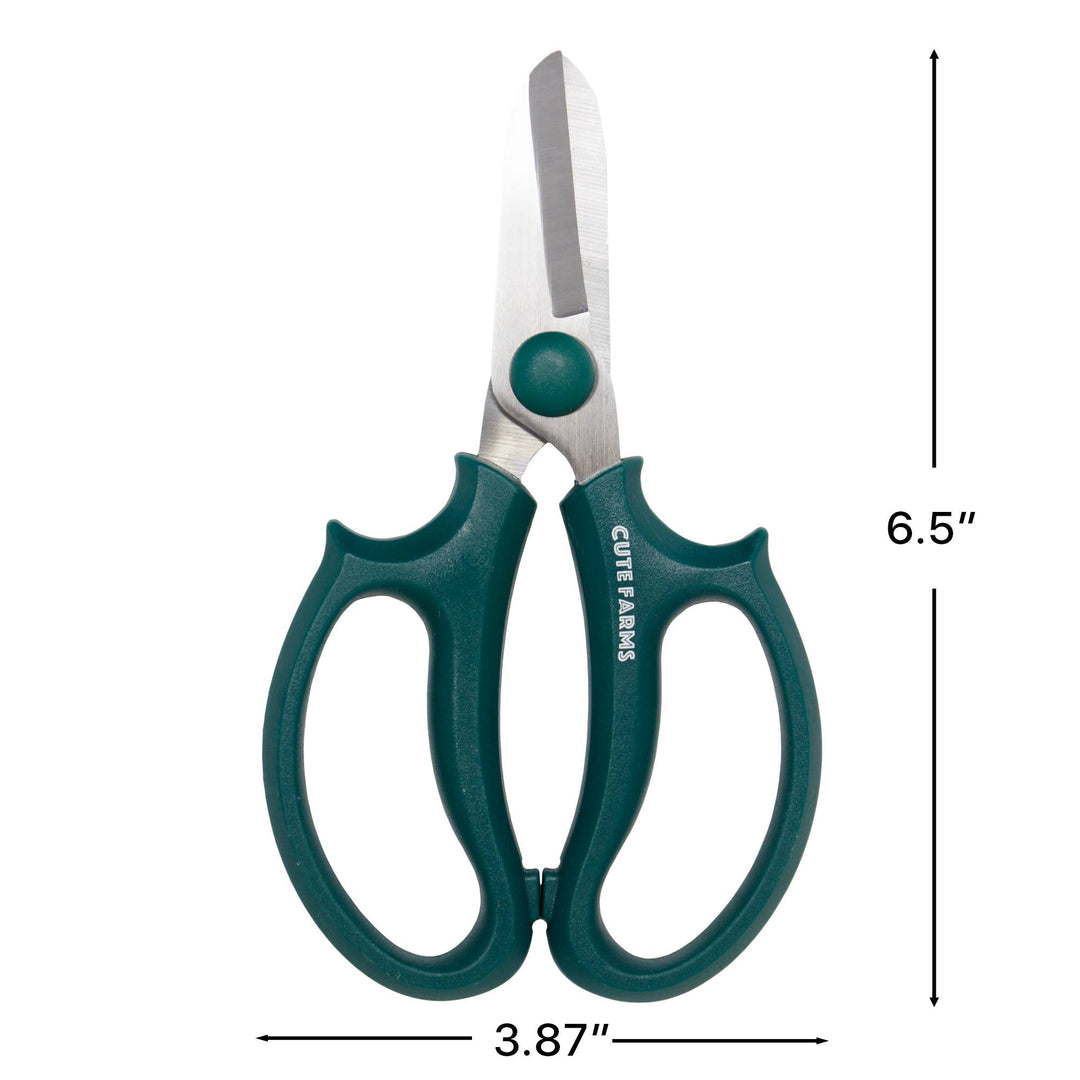 Green-handled scissors with measurements on a white background