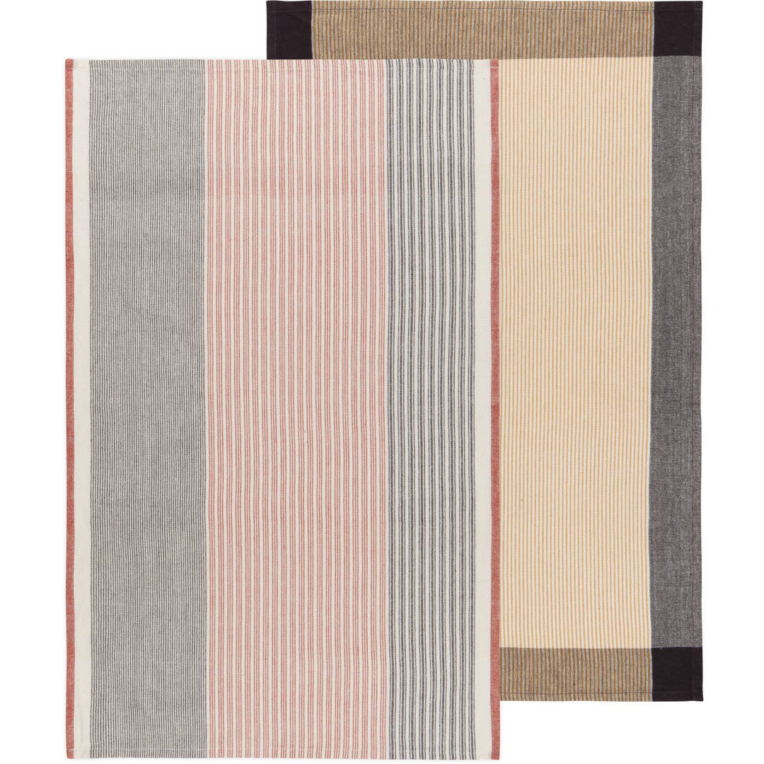 Set of striped rugs in various colors on a white background