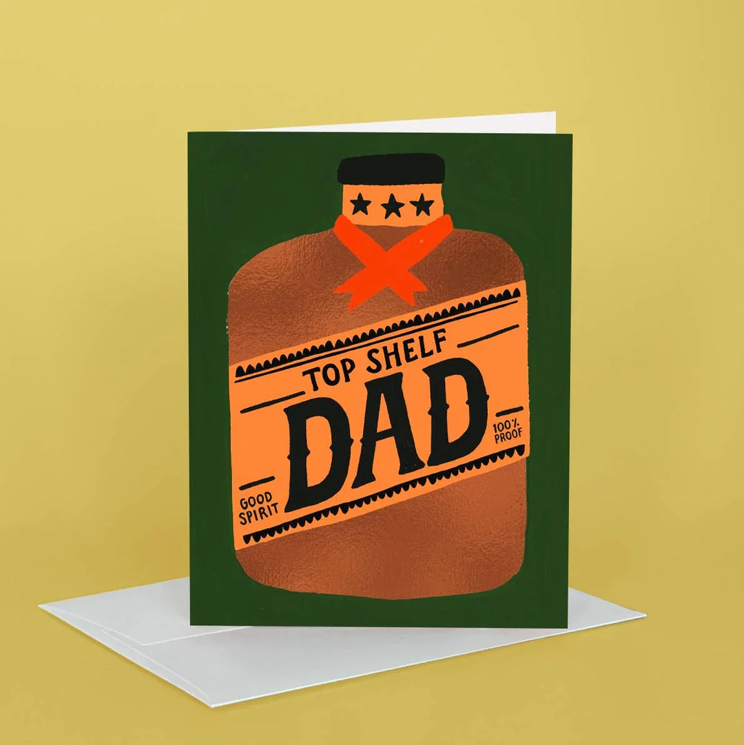 Greeting card with a bottle design and 'Top Shelf Dad' text on a yellow background