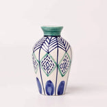 Hand-painted ceramic vase with blue and green geometric patterns, perfect for floral arrangements
