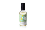 Green Tea + Lemon room fragrance spray in sleek glass bottle with black cap
