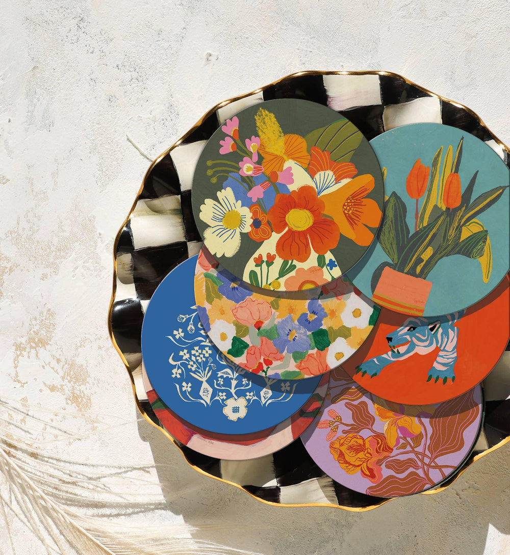 Colorful floral coasters with vibrant blooms and artistic designs, perfect for home decor and gifting.