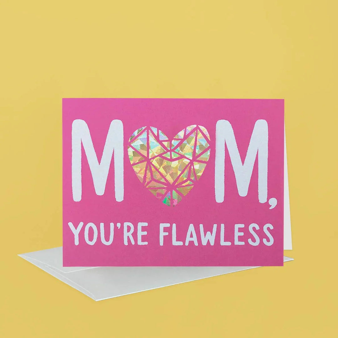 Greeting card with 'Mom, you're flawless' text on a pink background with a heart design.