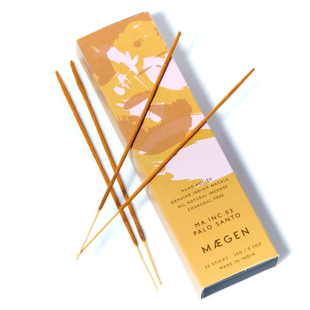 Máegen Palo Santo incense sticks with packaging on a white background