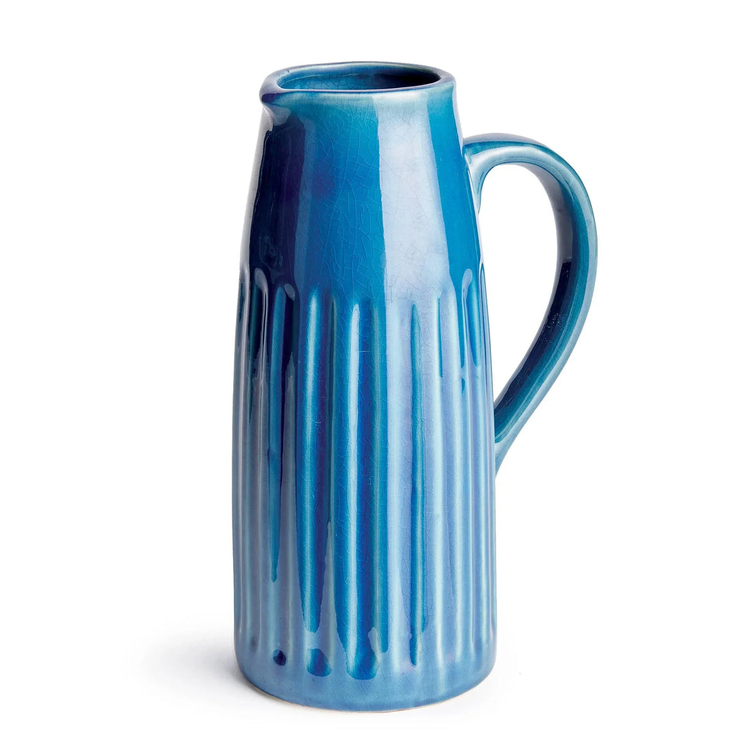 Blue ceramic pitcher with ribbed texture and glossy finish, ideal for floral arrangements