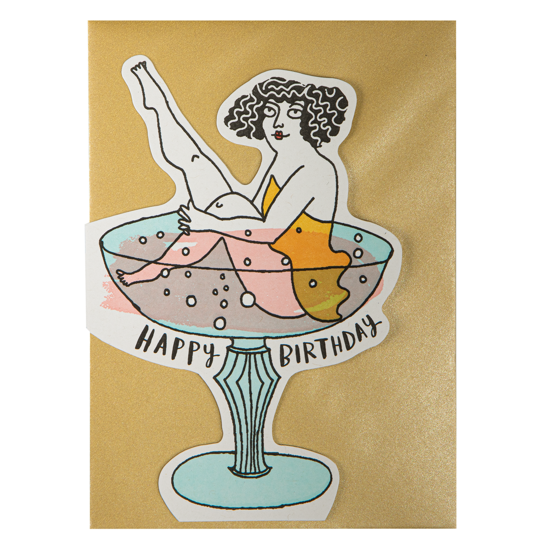 Illustration of a woman in a glass with 'Happy Birthday' text on a gold background
