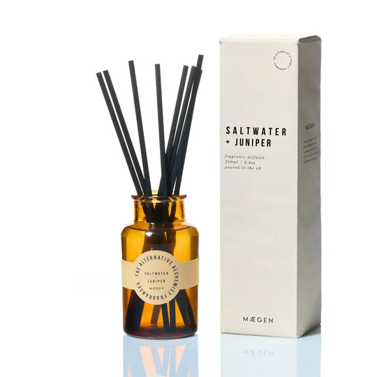 Saltwater + Juniper fragrance diffuser with amber glass bottle and black reeds, UK-made