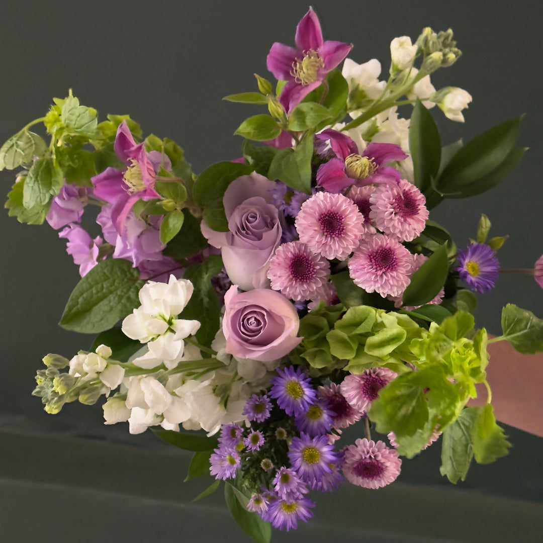 purple and green flower bouquet