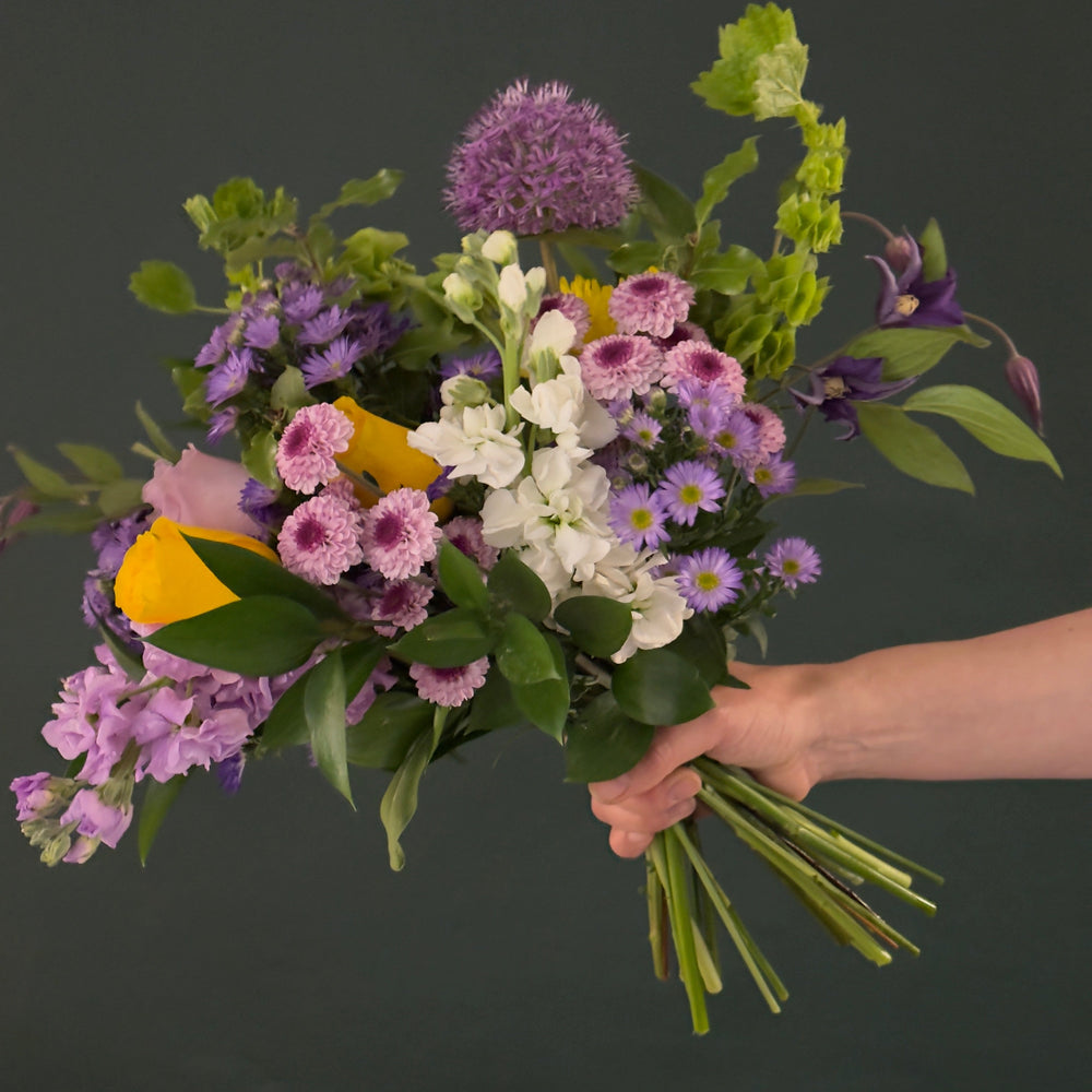 purple and yellow flower bouquet