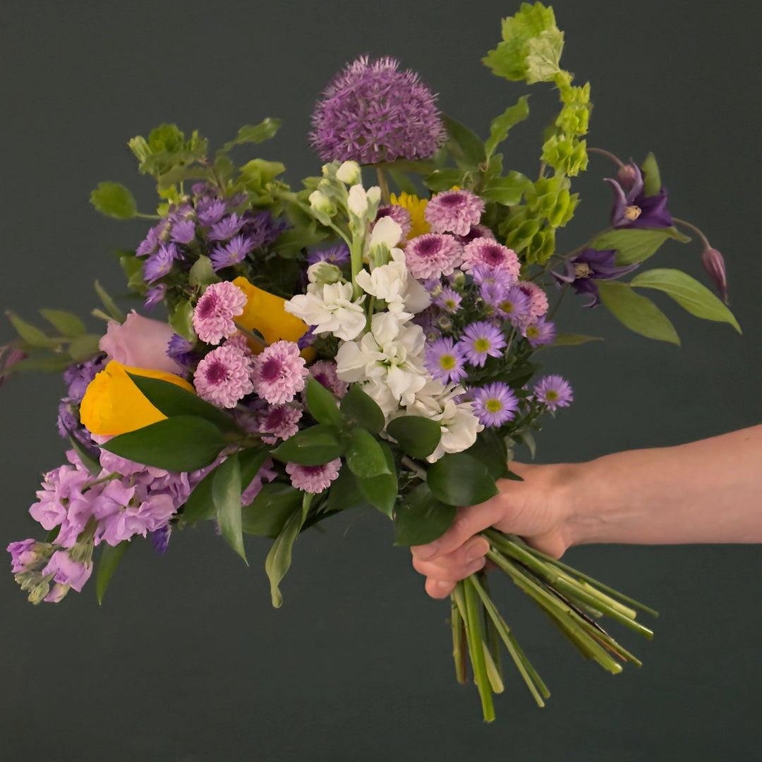 purple and yellow flower bouquet
