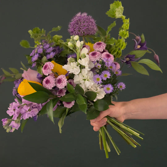 purple and yellow flower bouquet