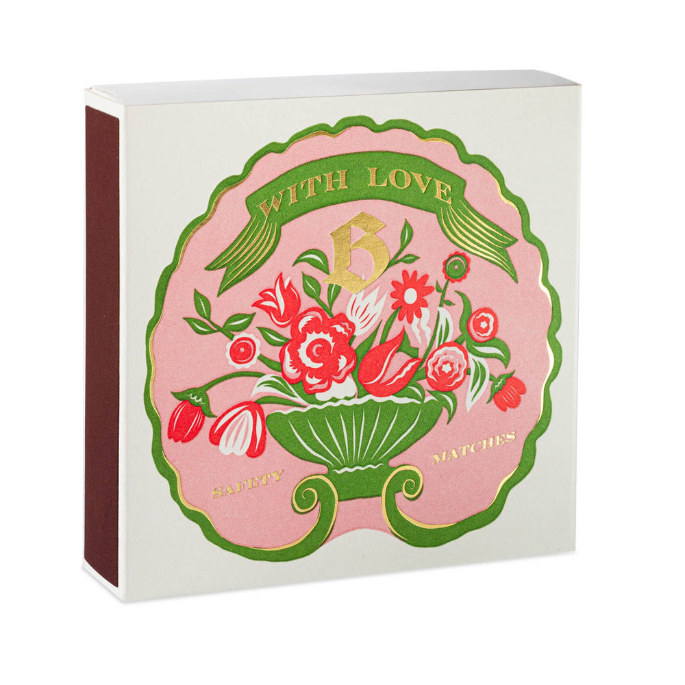 Matchbox with floral design and 'With Love' text on a white background