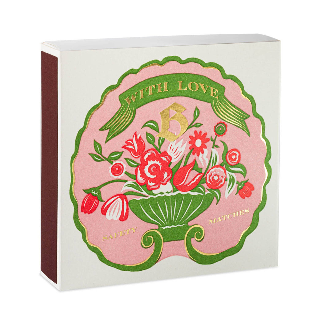 Matchbox with floral design and 'With Love' text on a white background
