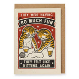 Card with illustration of two cats playing and text about kittens feeling happy.