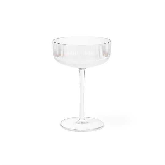 Elegant ribbed coupe glass for cocktails or champagne, perfect for entertaining