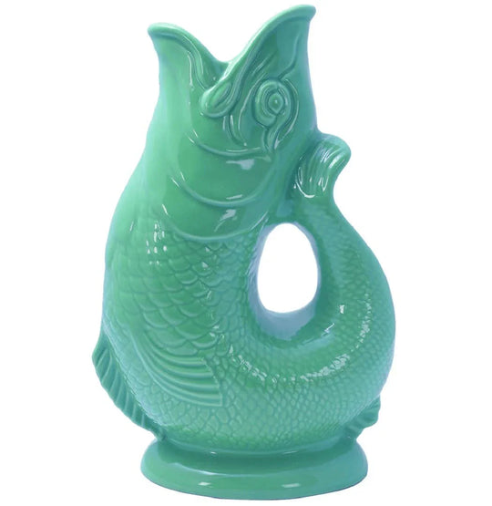 Green ceramic fish-shaped vase with textured scales and elegant curves