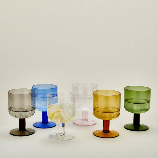 Colorful glassware set with lemonade, perfect for floral-themed gatherings and curated gifts.