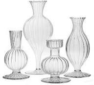 Clear glass vases with ribbed designs for floral arrangements