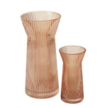 Set of two ribbed rose gold glass vases for floral arrangements
